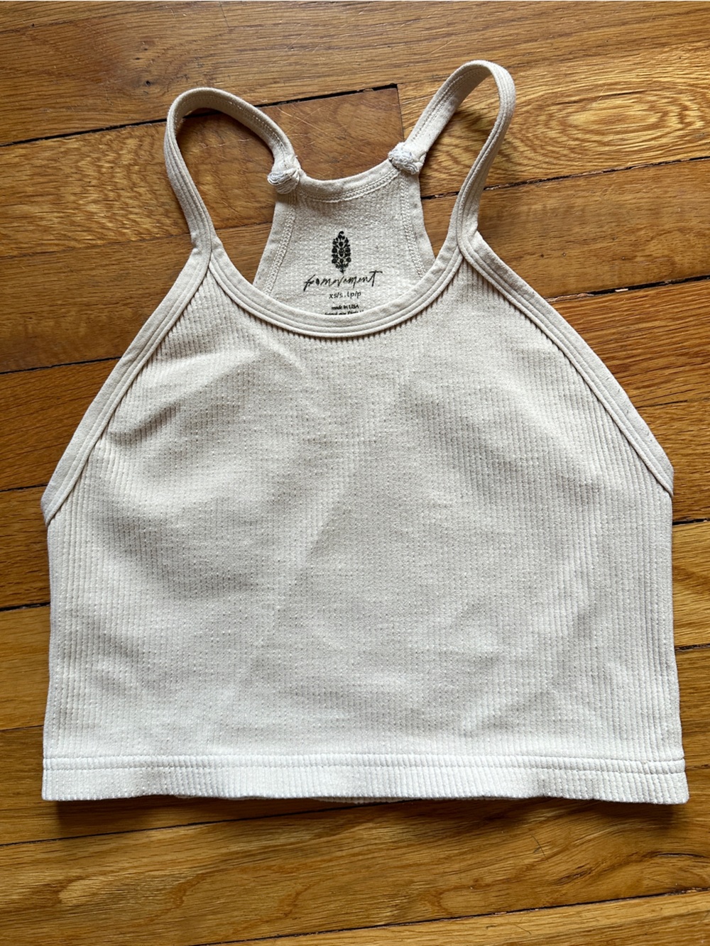FP Movement Happiness Runs Crop Tank in cream/off-white color
